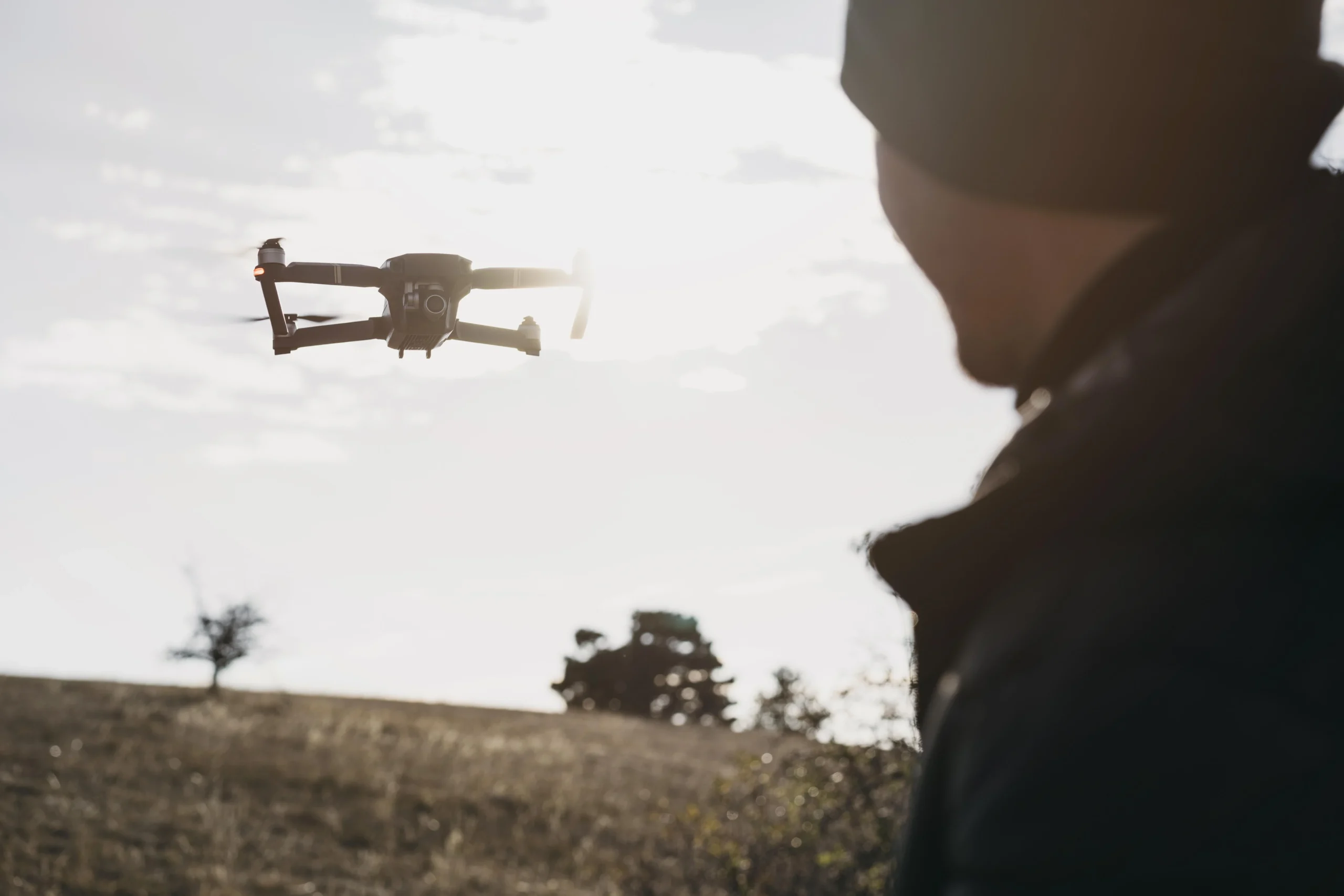 Close up man watching drone