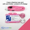 Personalised pink hearing loss card with biodegradable card holder, safety breakaway lanyard and hearing impairment pin badge.